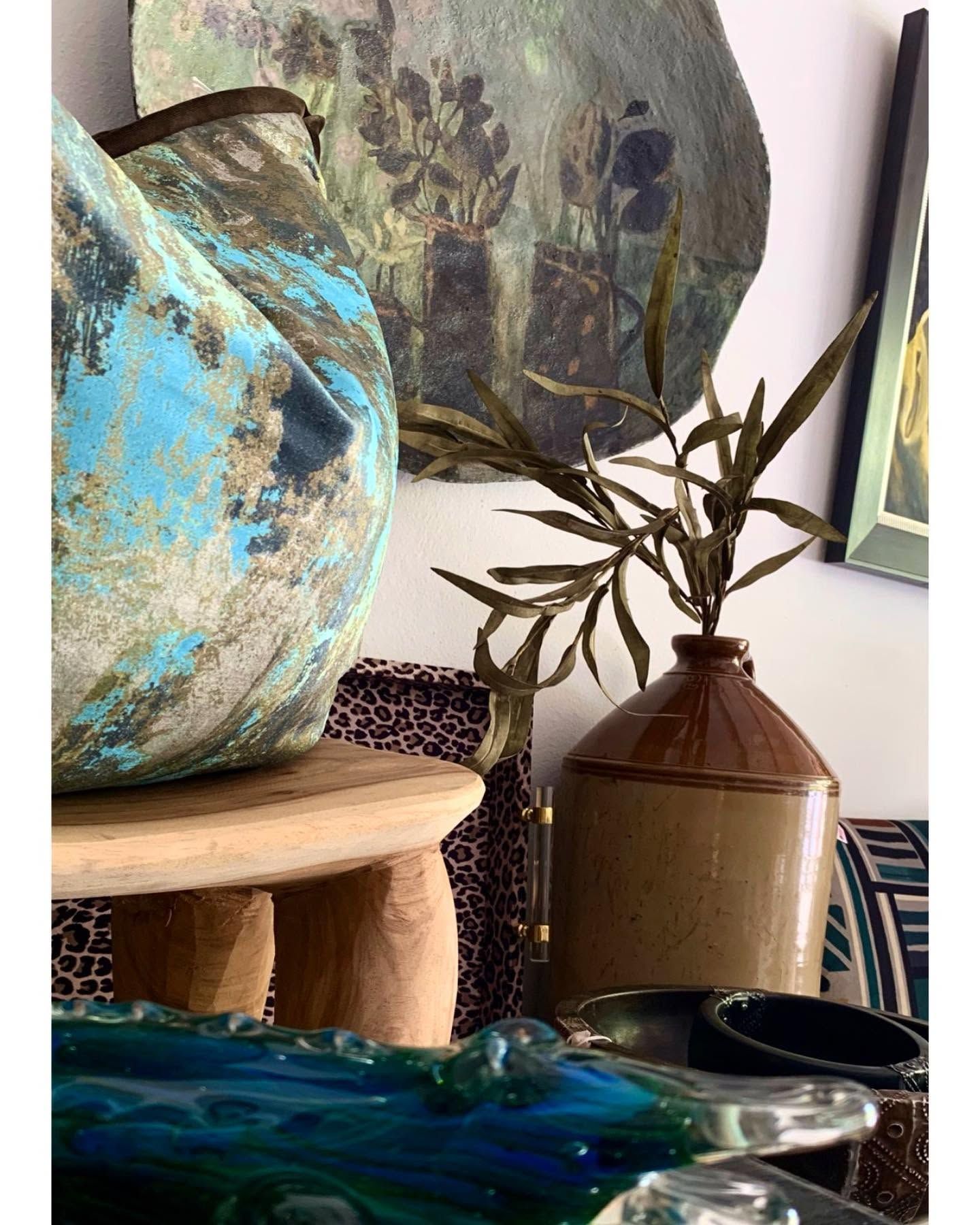 A blue glazed vessel and a stoneware jug