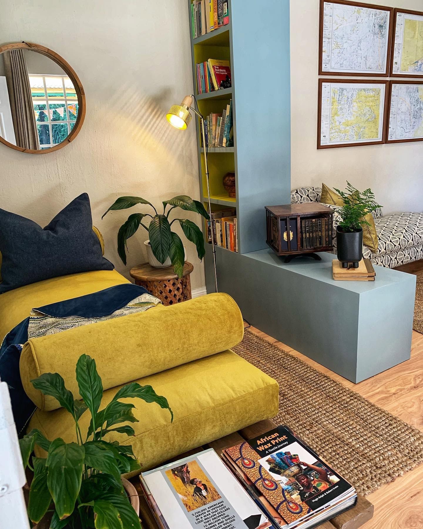 Yellow bolster cushions on a chaise
